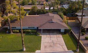 Aerial view of a residential driveway and surrounding property to help find property lines before expansion