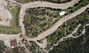 Aerial view of a property with shared roads and access routes in the context of ALTA survey requirements